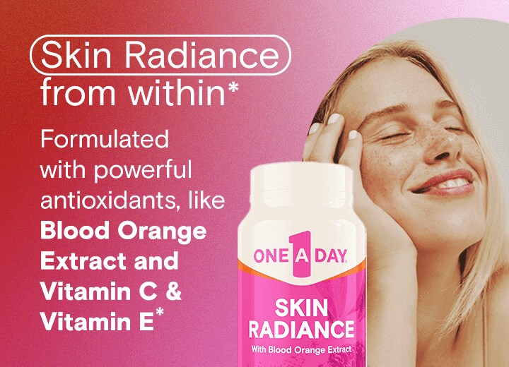 young woman smiling next to a pink and white bottle of One A Day® Skin Radiance